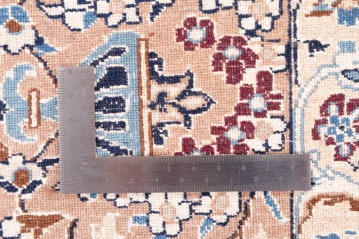 Surface texture of 2005s Nain rug with natural Wool and intricate pattern
