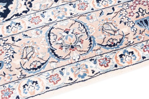 Backside of handmade 2005s Nain rug showing knot structure and weave density