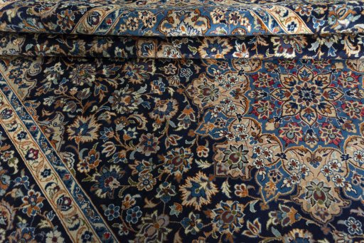 Close-up detail of 2000s Najafabad rug from Iran / Persia showing Wool weave