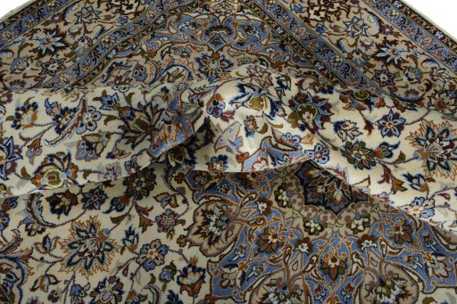 Surface texture of 2000s Najafabad rug with natural Wool and intricate pattern