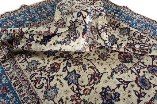 Surface texture of 2000s Najafabad rug with natural Wool and intricate pattern
