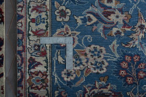 Backside of handmade 2000s Najafabad rug showing knot structure and weave density