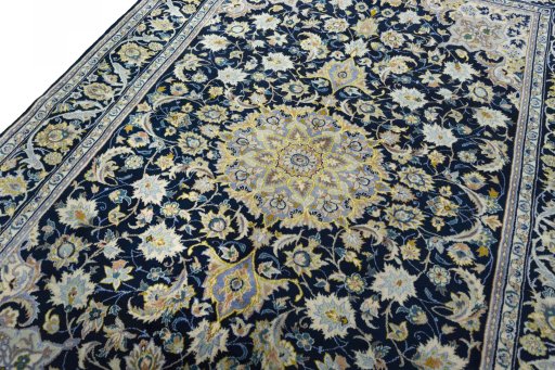 Backside of handmade 2000s Najafabad rug showing knot structure and weave density