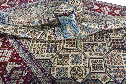 Surface texture of 2000s Najafabad rug with natural Wool and intricate pattern