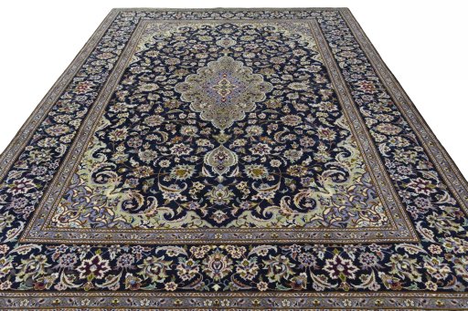 Surface texture of 2000s Najafabad rug with natural Wool and intricate pattern