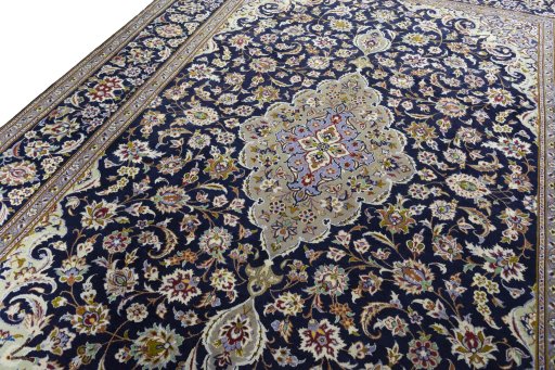 Backside of handmade 2000s Najafabad rug showing knot structure and weave density