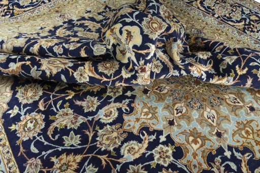 Surface texture of 2000s Najafabad rug with natural Wool and intricate pattern