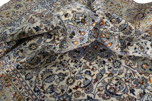 Surface texture of 2000s Najafabad rug with natural Wool and intricate pattern