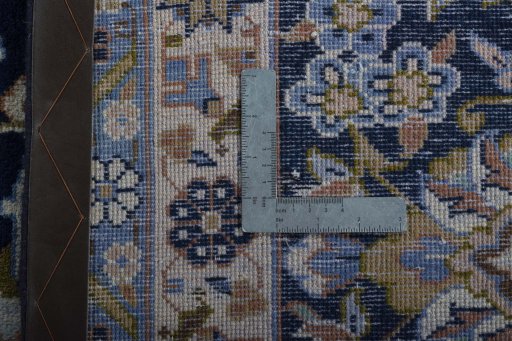 Backside of handmade 2000s Najafabad rug showing knot structure and weave density