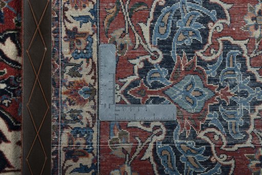 Backside of handmade 1930s Najafabad rug showing knot structure and weave density
