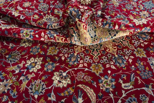 Surface texture of 2000s Najafabad rug with natural Wool and intricate pattern