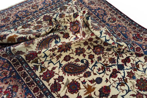 Surface texture of 1950s Najafabad rug with natural Wool and intricate pattern