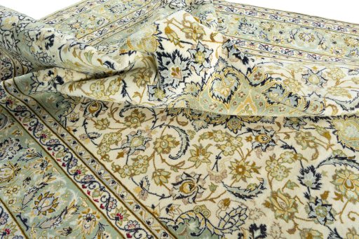 Surface texture of 2000s Najafabad rug with natural Wool and intricate pattern