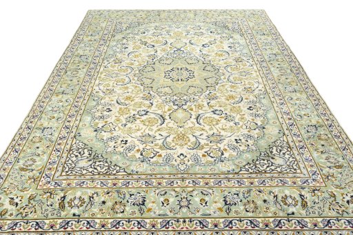 Surface texture of 2000s Najafabad rug with natural Wool and intricate pattern
