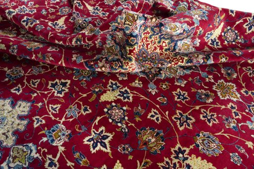 Surface texture of 2000s Najafabad rug with natural Wool and intricate pattern