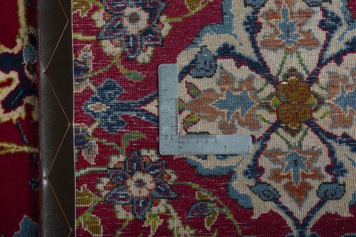 Backside of handmade 2000s Najafabad rug showing knot structure and weave density