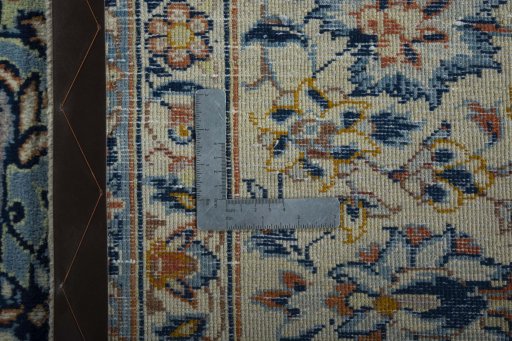 Backside of handmade 2000s Najafabad rug showing knot structure and weave density