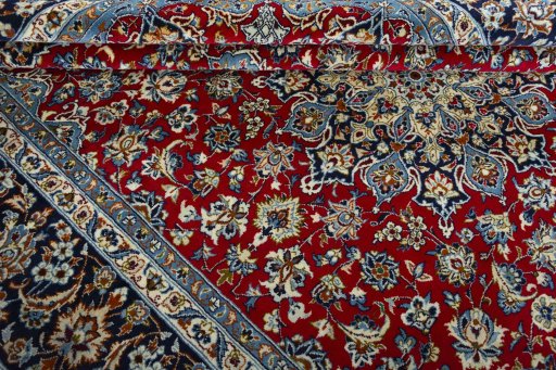 Close-up detail of 2000s Najafabad rug from Iran / Persia showing Wool weave