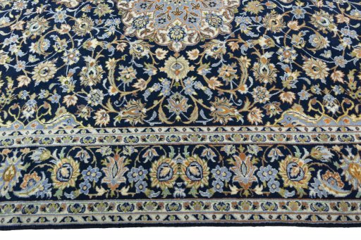 Corner detail of 2000s Najafabad rug showing border pattern and Wool pile