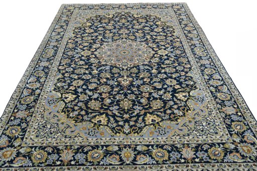 Surface texture of 2000s Najafabad rug with natural Wool and intricate pattern
