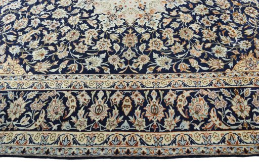 Corner detail of 2000s Najafabad rug showing border pattern and Wool pile