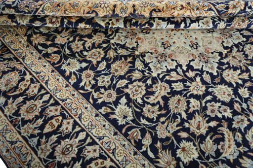 Close-up detail of 2000s Najafabad rug from Iran / Persia showing Wool weave