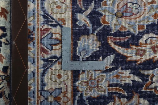 Backside of handmade 2000s Najafabad rug showing knot structure and weave density