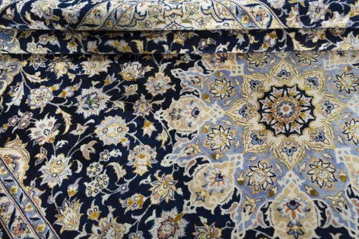 Close-up detail of New Najafabad rug from Iran / Persia showing Wool weave