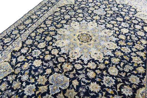 Backside of handmade New Najafabad rug showing knot structure and weave density