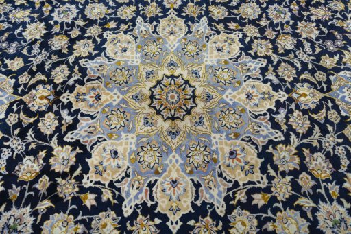 Central medallion detail of New Najafabad rug from Iran / Persia