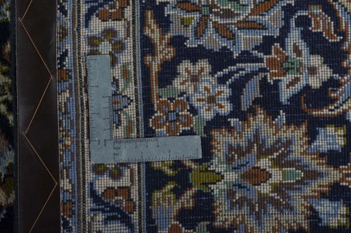 Backside of handmade 2000s Najafabad rug showing knot structure and weave density