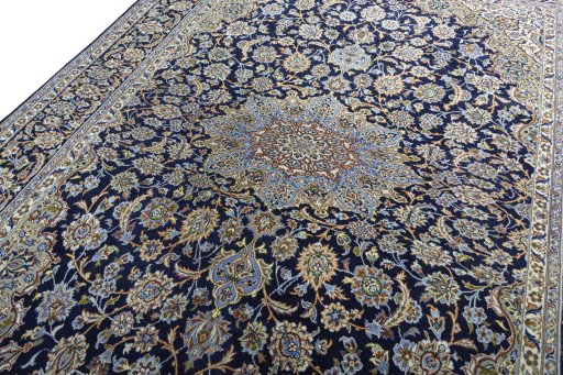 Backside of handmade 2000s Najafabad rug showing knot structure and weave density