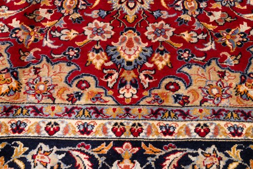 Close-up detail of 1990s Najafabad rug from Iran / Persia showing Wool weave