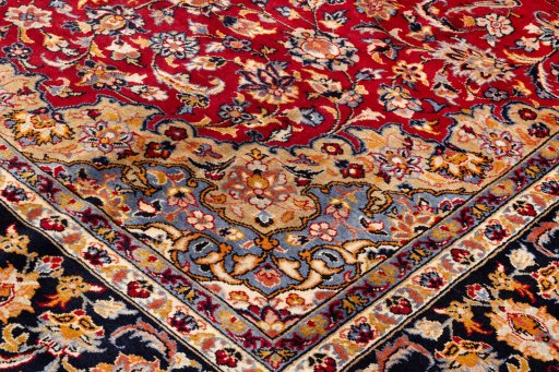 Backside of handmade 1990s Najafabad rug showing knot structure and weave density