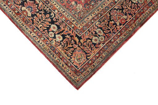 Backside of handmade 1920s Sarough rug showing knot structure and weave density