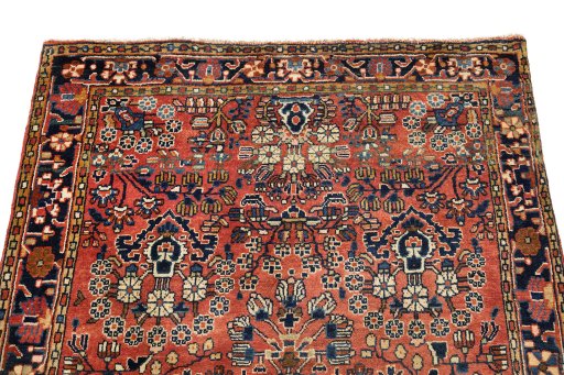 Surface texture of 1920s Sarough rug with natural Wool and intricate pattern