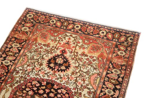 Surface texture of 1900s Sarough rug with natural Wool and intricate pattern