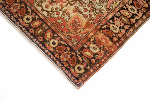 Backside of handmade 1900s Sarough rug showing knot structure and weave density