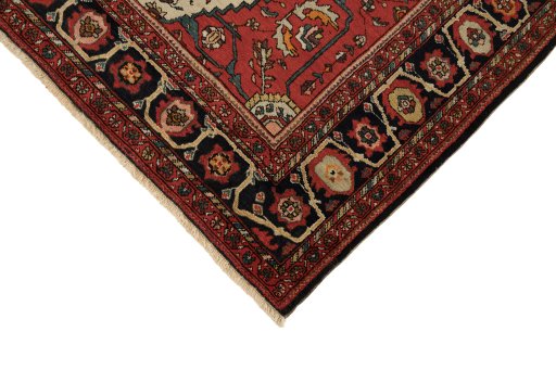 Backside of handmade 1900s Sarough rug showing knot structure and weave density