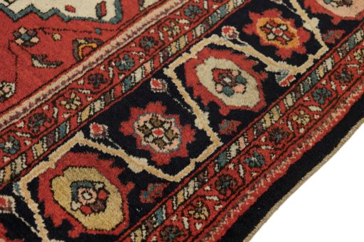 Close-up detail of 1900s Sarough rug from Iran / Persia showing Wool weave