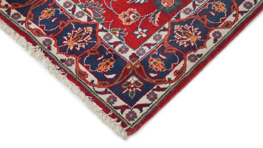 Backside of handmade New Sarough rug showing knot structure and weave density