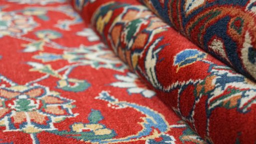 Close-up detail of New Sarough rug from Iran / Persia showing Wool weave