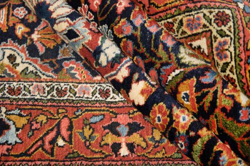 Corner detail of 1930s Sarough rug showing border pattern and Wool pile
