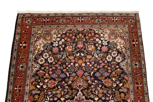 Surface texture of 1930s Sarough rug with natural Wool and intricate pattern