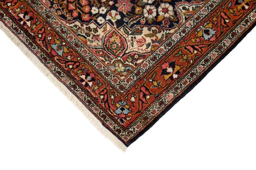 Backside of handmade 1930s Sarough rug showing knot structure and weave density