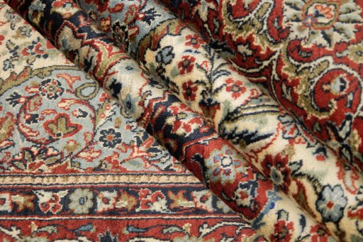 Corner detail of New Sarough rug showing border pattern and Wool pile