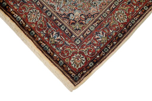 Backside of handmade New Sarough rug showing knot structure and weave density