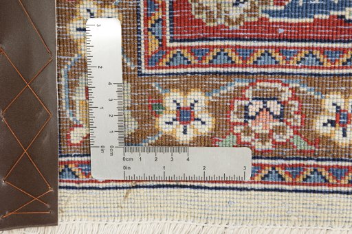 Corner detail of 1970s Sarough rug showing border pattern and Wool pile