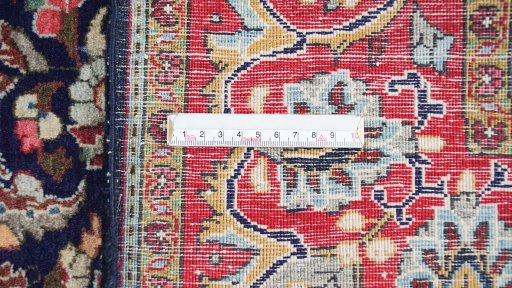 Corner detail of 1960s Sarough rug showing border pattern and Wool pile