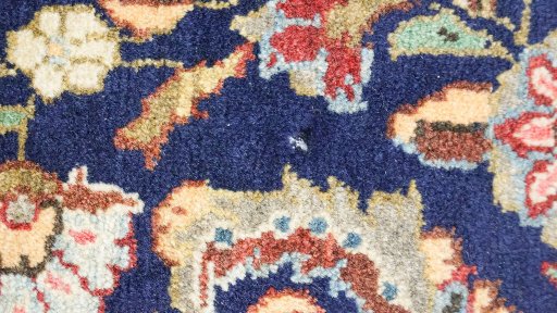 Close-up detail of 1960s Sarough rug from Iran / Persia showing Wool weave